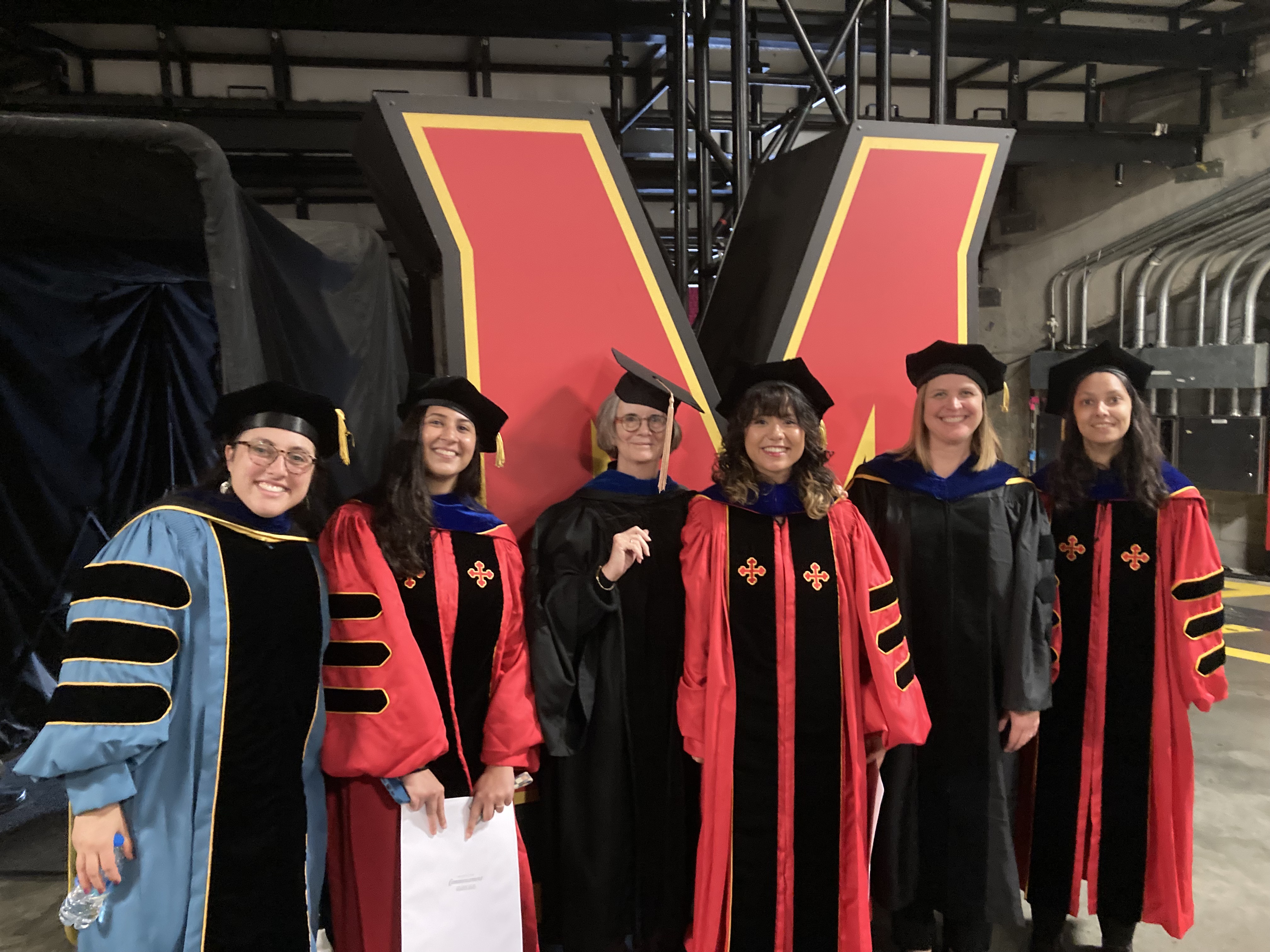 Sayaka with her friends and faculty at graduation!