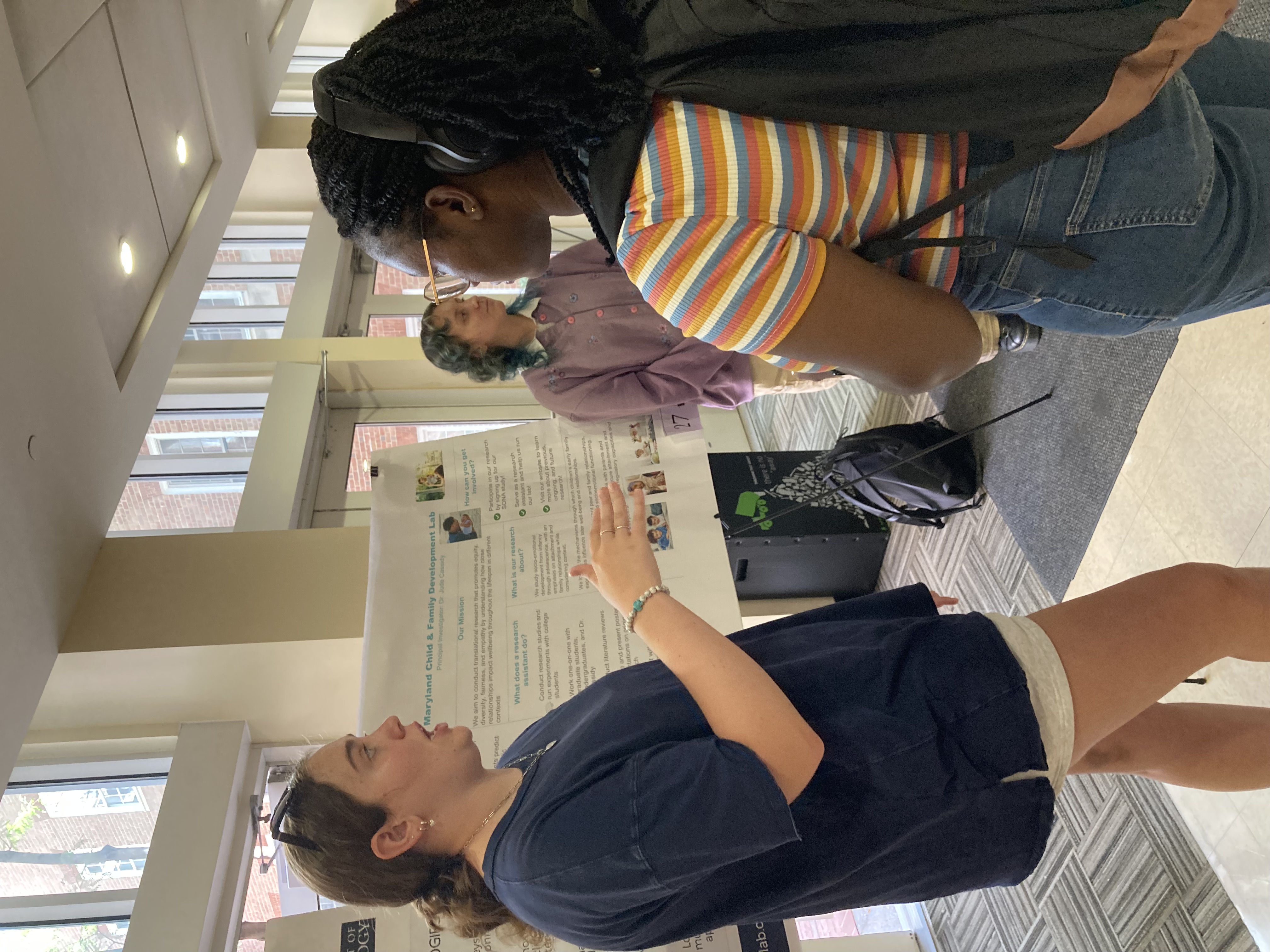Our undergraduate RA Emily presenting to an undergraduate at Welcome to PSYC Day 2026