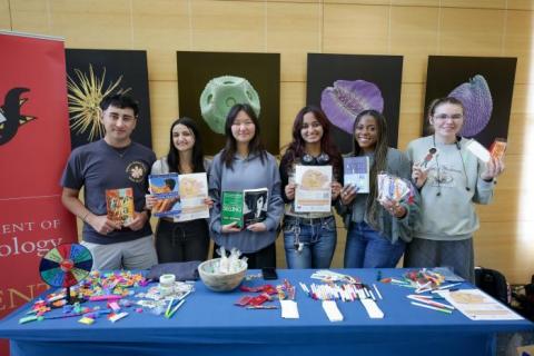 Group of students collecting books for donation to a local prison 